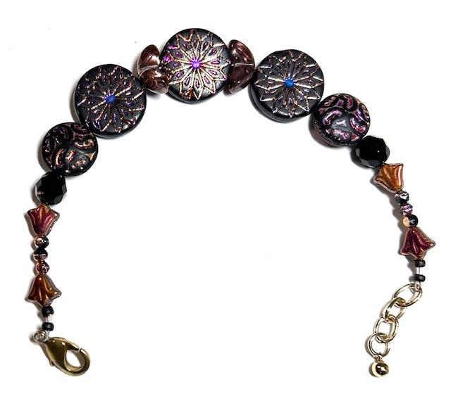 2571. $20. Czech glass black+