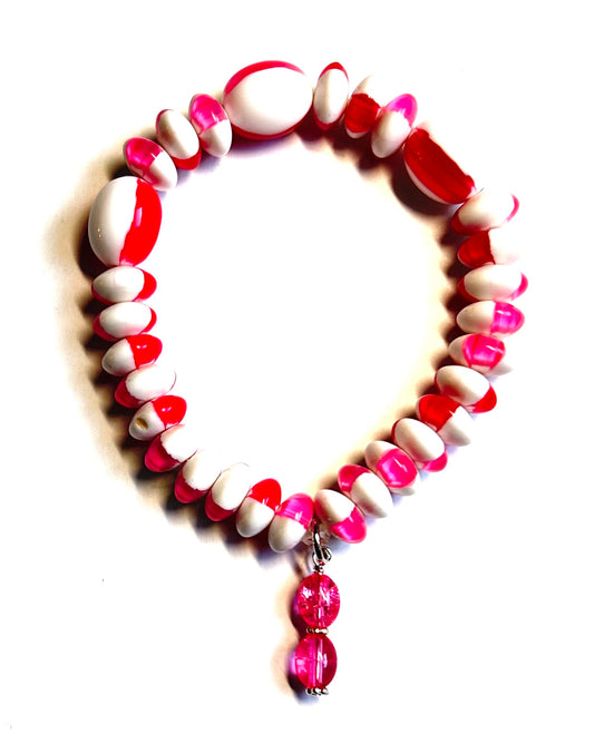 2577.   $16.  Wh & pink lucite