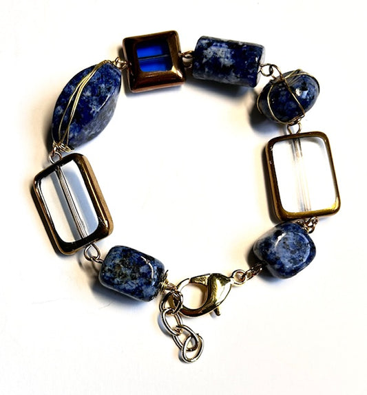 2581.  $22.  Lapis & gold strung