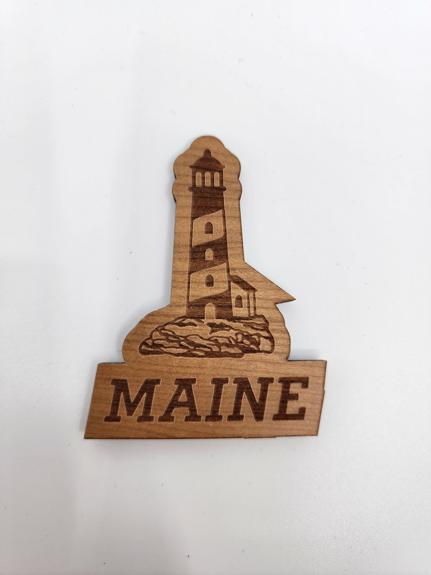 Wooden magnet Engraved with a Maine lighthouse